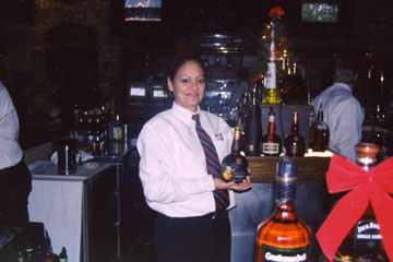 Graduate of our Nashville Bartending School taken on-the-job in Nashville!