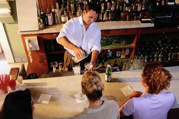 Lear behind an actual bar the Capitol Bartending School in Harrisburg, Pennsylvania!